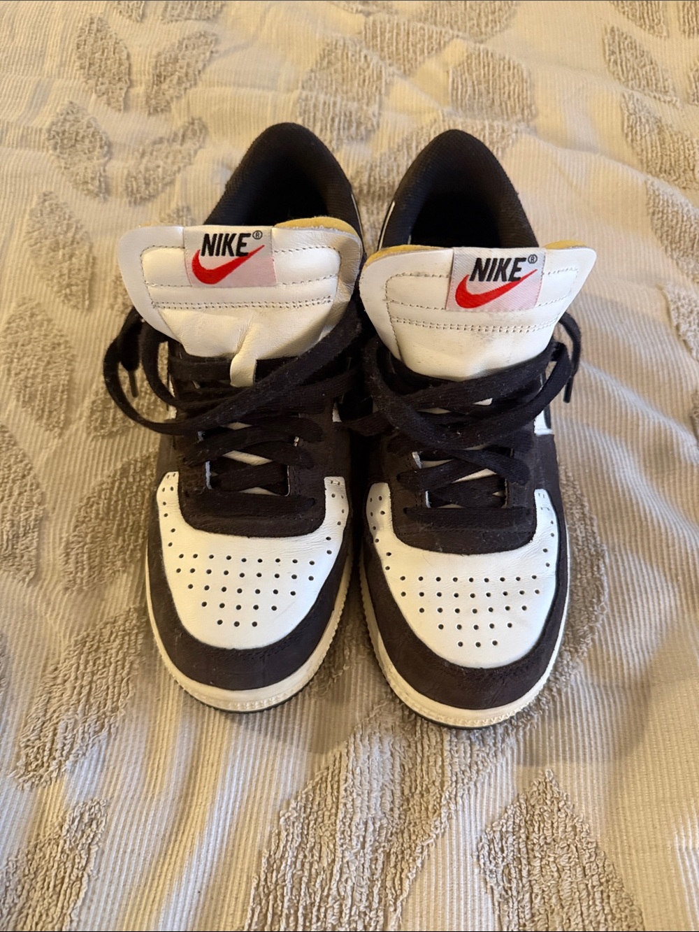 Nike Kids Black and White High-Top Sneakers with Red Swoosh